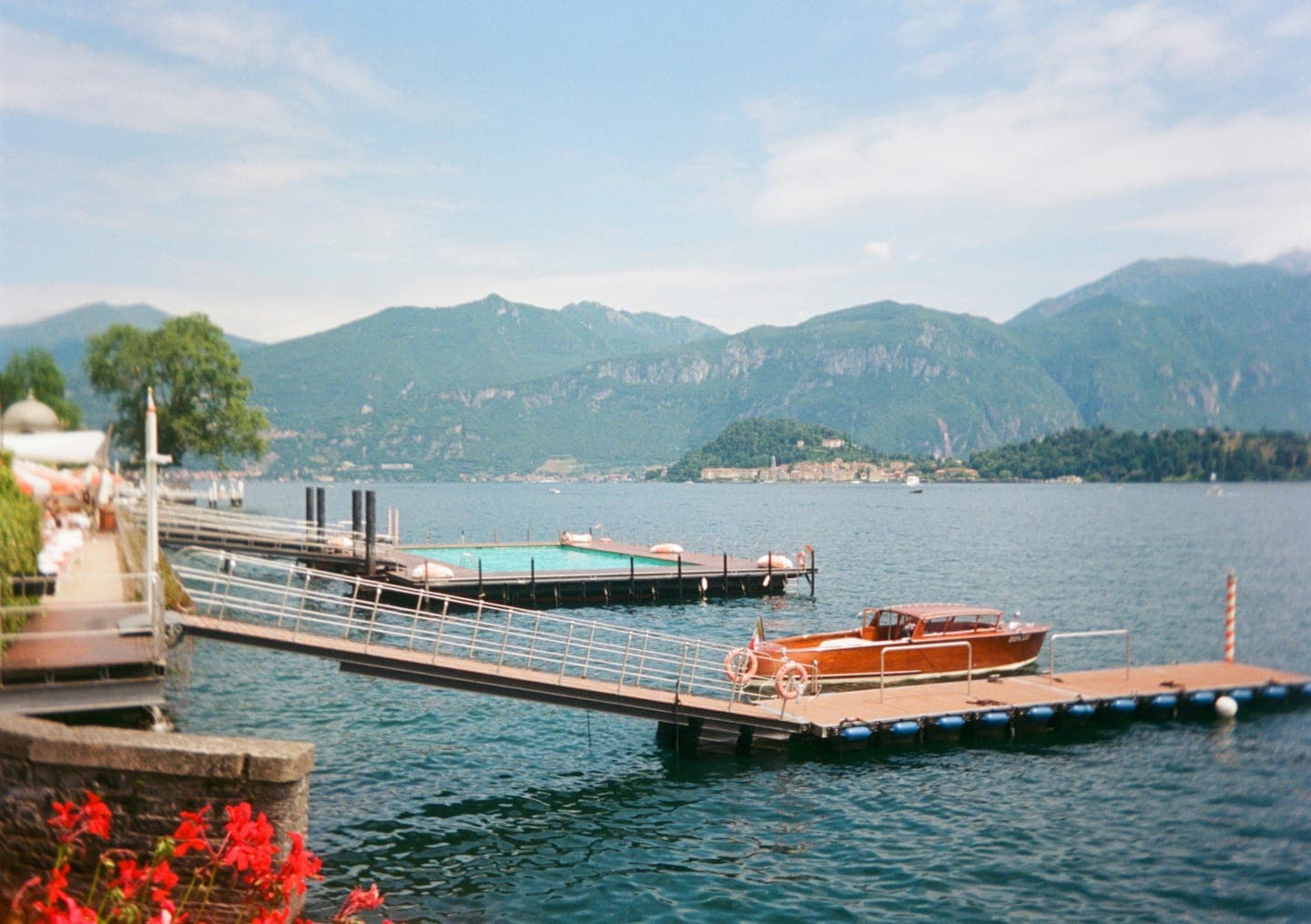 The jetty below Il Pontile, with the house launch moored against it
