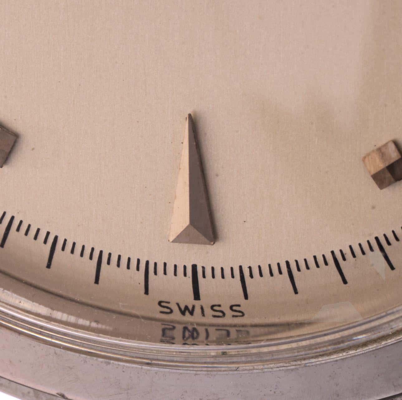 The dial at six o'clock, showing the enamel graphics and the minute track