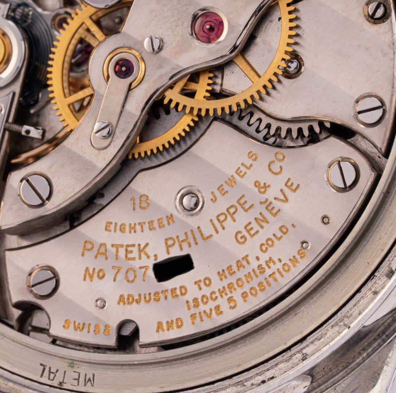 The caliber under the loupe, photographed before the piece was bought rather than after